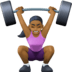 🏋🏾‍♀️ woman lifting weights: medium-dark skin tone display on Facebook